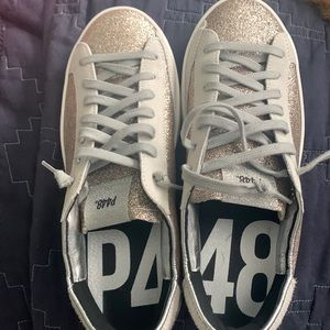 Brand new P448 gold John sneakers.. never worn! Grey laces.. gold glitter!
